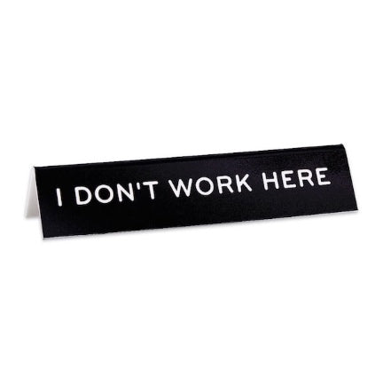I dont work here desk sign