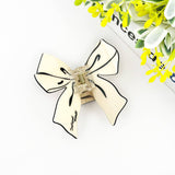 Elegant Bow Claw Clip: Black