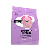 Crochet kit packaging for 'Lily the Annelid' by The Loop Brigade on a white background