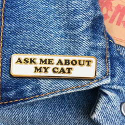 ask me about my cat enamel pin by the found