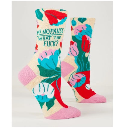Colorful socks with floral design and text on a light gray background